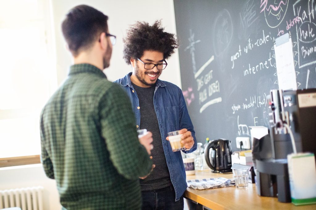 Young business people having coffee break